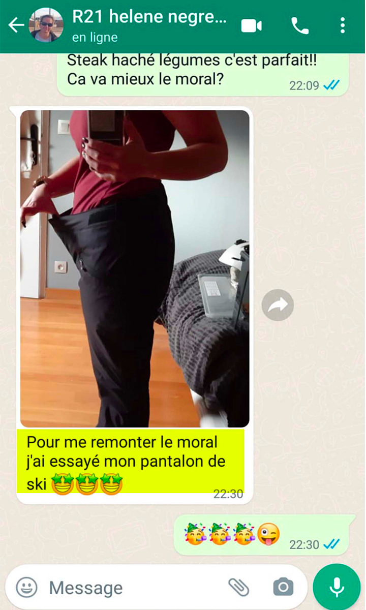 Message WhatsApp d'Hélène, photo d'elle en pantalon de ski qui flotte